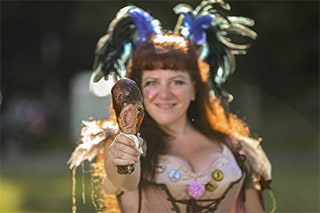 woman holding turkey leg